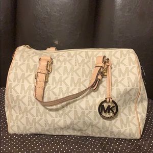 Michael Kors white monogrammed handbag